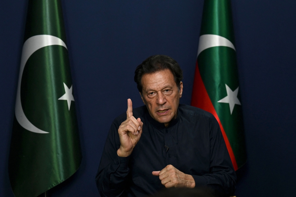Former Pakistan's Prime Minister Imran Khan during an interview at his residence in Lahore on May 18, 2023. (Photo by Arif Ali / AFP)