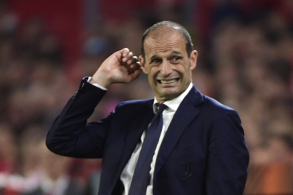 Juventus' Italian coach Massimiliano Allegri reacts to Sevilla's second goal scored by Argentinian forward Erik Lamela during the UEFA Europa League semi-final second leg football match between Sevilla FC and Juventus at the Ramon Sanchez Pizjuan stadium in Seville on May 18, 2023. (Photo by CRISTINA QUICLER / AFP)