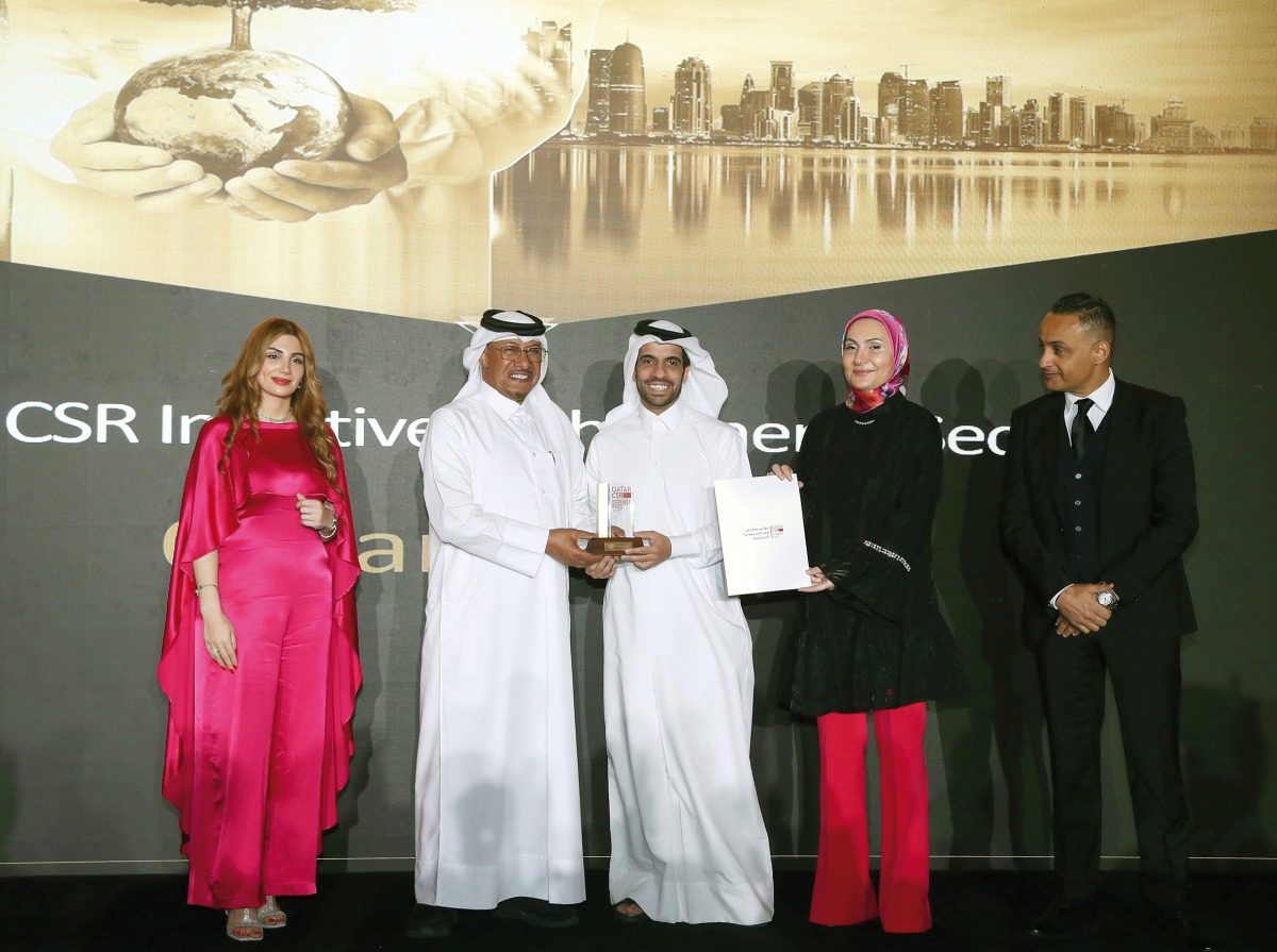 Shell’s NXplorers officials receiving the award during Qatar CSR Summit 2023. 