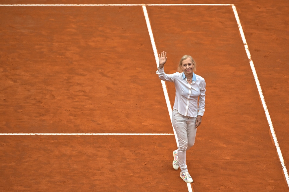 Czech born US former professional tennis player, Martina Navratilova waves to the public prior to the final of the Men's ATP Rome Open tennis tournament between Denmark's Holger Rune and Russia's Daniil Medvedev, on the central court of Foro Italico in Rome on May 21, 2023. (Photo by Filippo MONTEFORTE / AFP)
