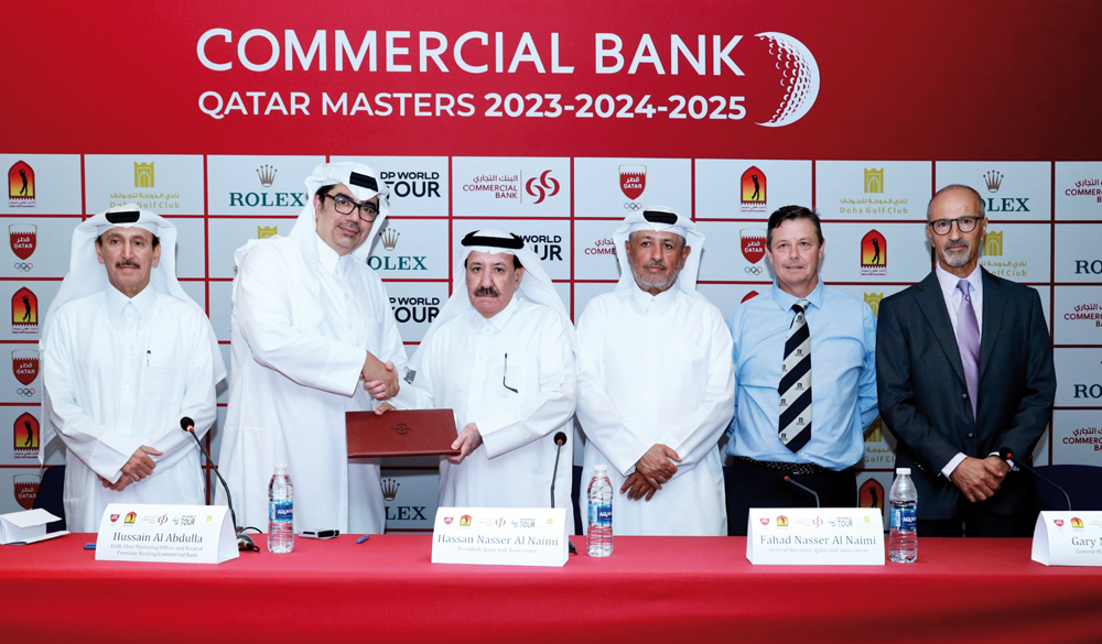 QGA President Hassan Nasser Al Naimi and Commercial Bank EGM, Chief Marketing Officer and Head of CB Premium Banking Hussain Al Abdulla along with other officials during the signing ceremony.   