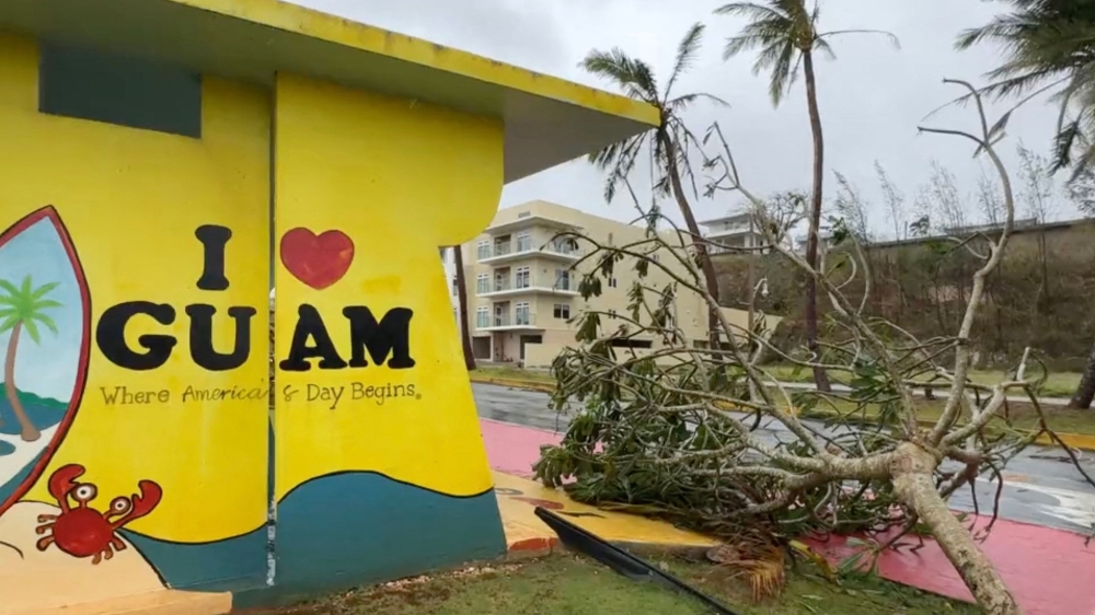 This video capture from James Reynolds' Twitter page @EarthUncutTV shows the damage caused by high winds and precipitation a day after Typhoon Mawar passed over Tumon Bay, Guam, May 25, 2023. (Photo by James REYNOLDS / AFP) 