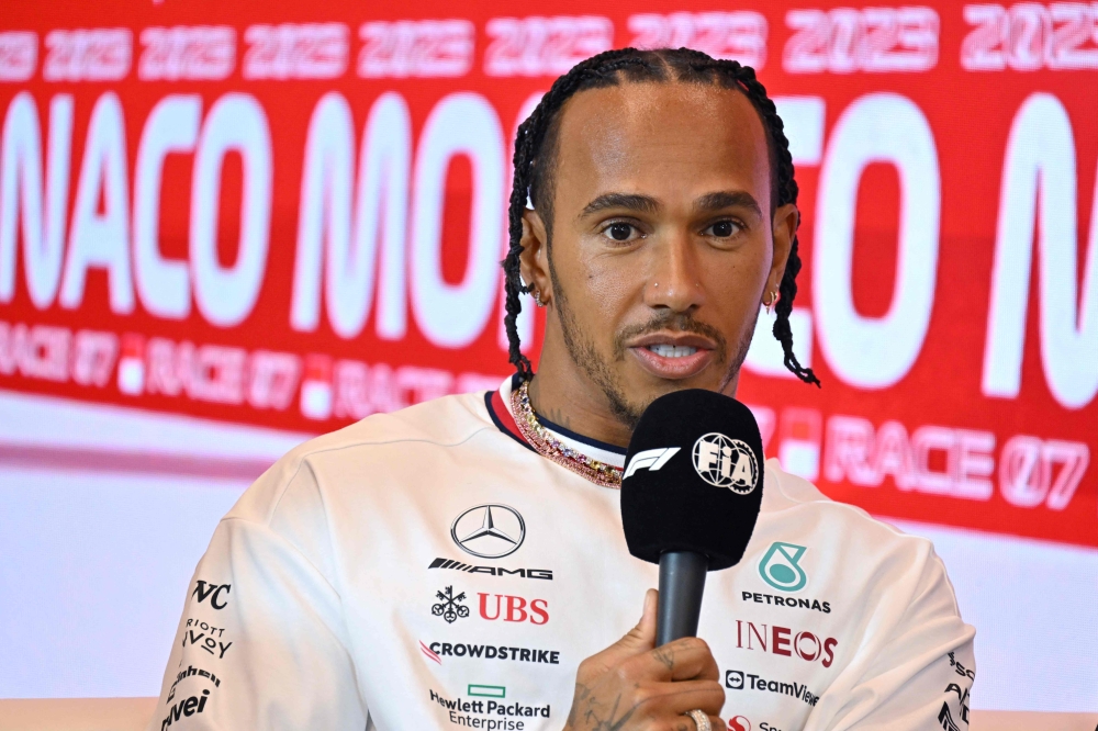 :Mercedes' British driver Lewis Hamilton attends the drivers' press conference ahead of the Monaco Formula One Grand Prix in Monaco on May 25, 2023. (Photo by ANDREJ ISAKOVIC / AFP)
