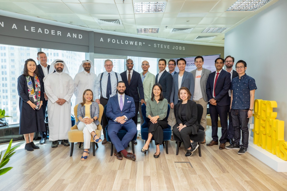 QFC officials and founders of Southeast Asian startups pose for a group photo.