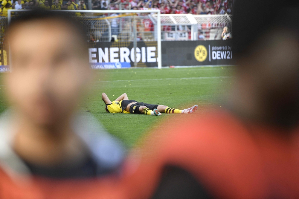 Dortmund's German midfielder Julian Brandt reacts after the German first division Bundesliga football match between Borussia Dortmund and 1 FSV Mainz 05 in Dortmund, western Germany on May 27, 2023. (Photo by Sascha Schuermann / AFP)