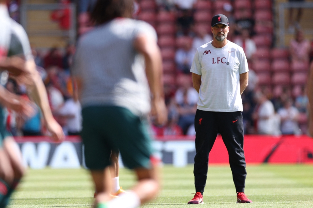 Liverpool's German manager Jurgen Klopp watches his players warm up ahead of the English Premier League football match between Southampton and Liverpool at St Mary's Stadium in Southampton, southern England on May 28, 2023. (Photo by Adrian DENNIS / AFP