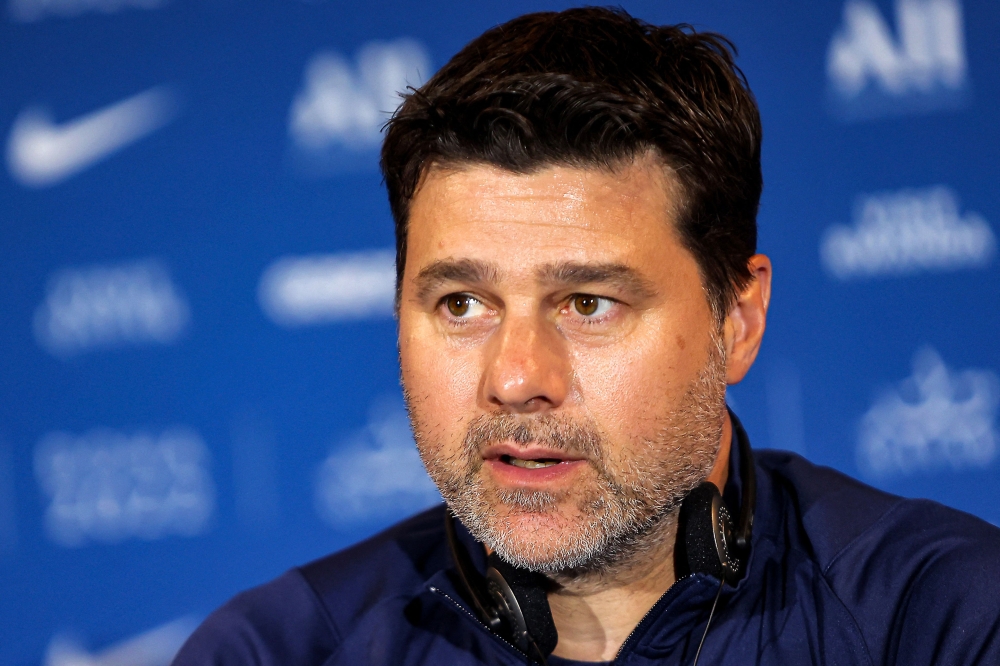 (Files) Paris Saint-Germain's Argentinian head coach Mauricio Pochettino at a press conference during the spring training camp in Qatar's capital Doha on May 15, 2022. (Photo by Karim Jaafar / AFP)