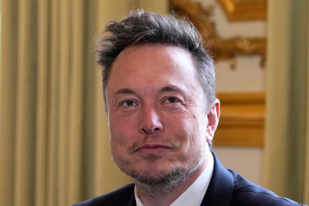 (FILES) SpaceX, Twitter and electric car maker Tesla CEO Elon Musk attends a meeting at the Elysee presidential palace in Paris on May 15, 2023. (Photo by Michel Euler / AFP)
