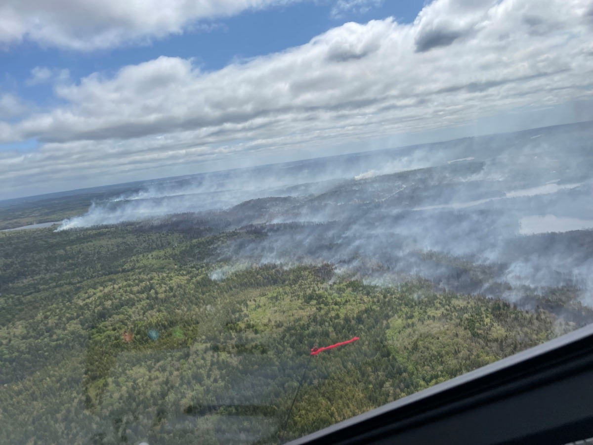 In this May 29, 2023, aerial image courtesy of the Nova Scotia Government in Canada, smoke rises from the Tantallon wildfire, west of Halifax. Photos by Handout / Nova Scotia Government / AFP