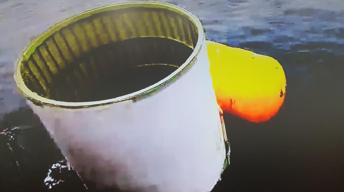 This handout photo taken on May 31, 2023 and provided by South Korean Defence Ministry in Seoul shows an object presumed to be part of North Korea's claimed 'Space Launch Vehicle' being salvaged by South Korea's military in waters 200km (124 miles) west of Eocheong Island in the Yellow Sea. (Photo by Handout / South Korean Defence Ministry / AFP) 