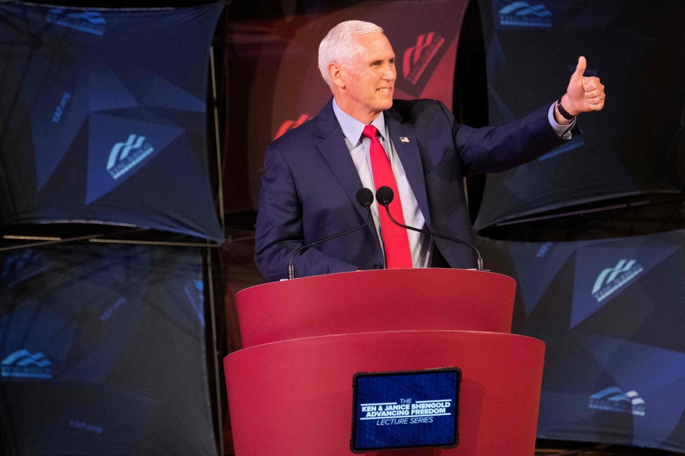Former US Vice President Mike Pence speaks at a campus lecture hosted by Young Americans for Freedom at the University of Virginia in Charlottesville, Virginia, on April 12, 2022. (Photo by Ryan M. Kelly / AFP)
