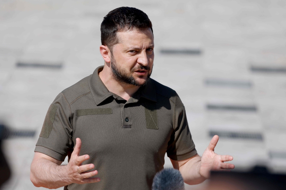 President of Ukraine Volodymyr Zelensky speaks to the media as he arrives for the European Political Community (EPC) Summit in Bulboaca, on June 1, 2023. Photo by Ludovic MARIN / AFP