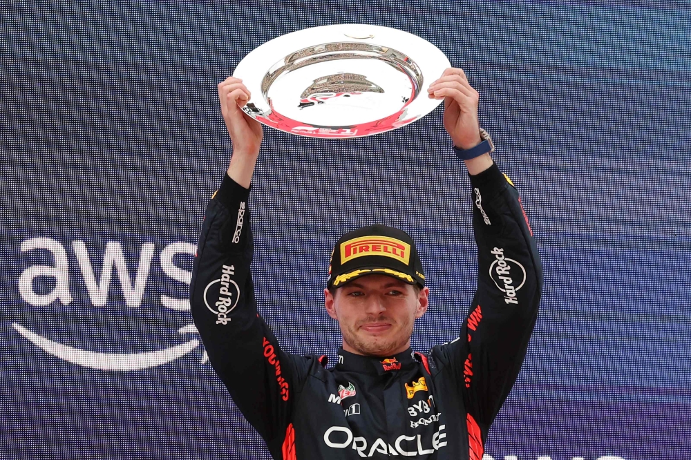 Red Bull's Dutch driver Max Verstappen celebrates winning the Spanish Formula One Grand Prix race at the Circuit de Catalunya on June 4, 2023 in Montmelo, on the outskirts of Barcelona. (Photo by Lluis Gene / AFP)