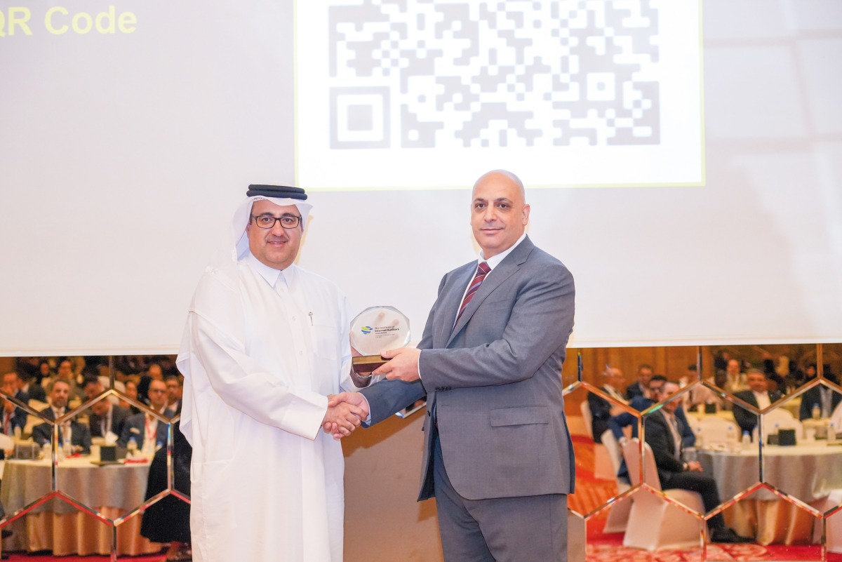 PwC and IIA officials during the recently held International Audit Conference at the Sheraton Grand Doha Resort and Convention Hotel.