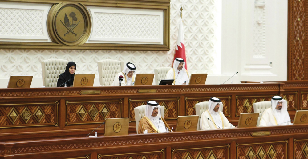 Shura Council Speaker H E  Hassan bin Abdullah Al Ghanim (top centre); Deputy Speaker H E Dr. Hamda bint Hassan Al Sulaiti (left) and Minister of Environment and Climate Change H E Sheikh Dr. Faleh bin Nasser bin Ahmed bin Ali Al Thani during the meeting of the Council, yesterday.