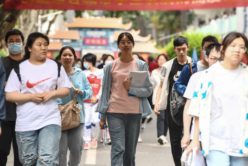 Students leave after their first exam during the first day of the National College Entrance Examination (NCEE), known as “gaokao”, in Nanjing, in China's eastern Jiangsu province on June 7, 2023. Photo by AFP