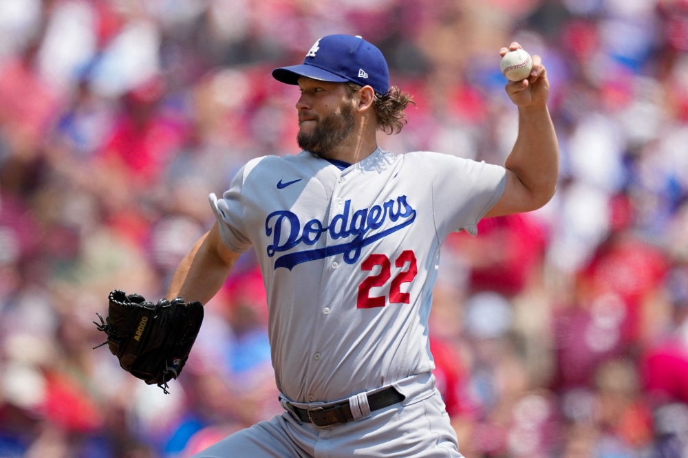 Clayton Kershaw #22 of the Los Angeles Dodgers pitches in the first inning against the Cincinnati Reds at Great American Ball Park on June 08, 2023 in Cincinnati, Ohio. Dylan Buell/Getty Images/AFP (Photo by Dylan Buell / GETTY IMAGES NORTH AMERICA / Getty Images via AFP)
