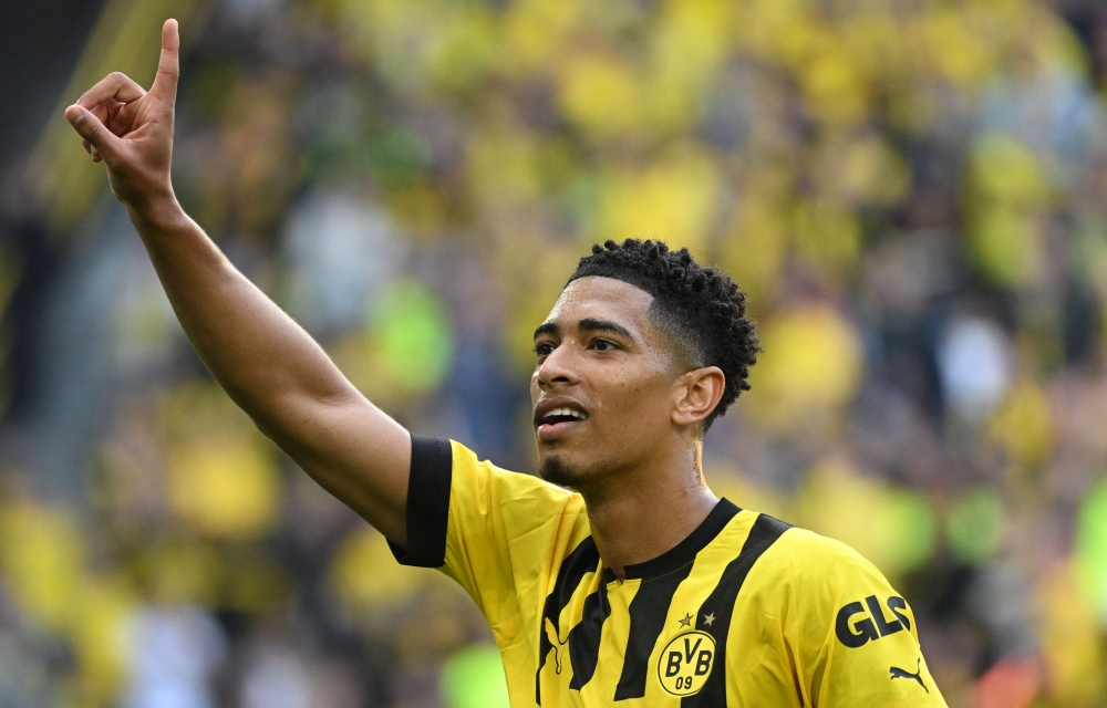(Files) Dortmund's English midfielder Jude Bellingham celebrates after scoring the 2-0 goal during the German first division Bundesliga football match in Dortmund, western Germany on May 13, 2023. (Photo by Ina Fassbender / AFP)