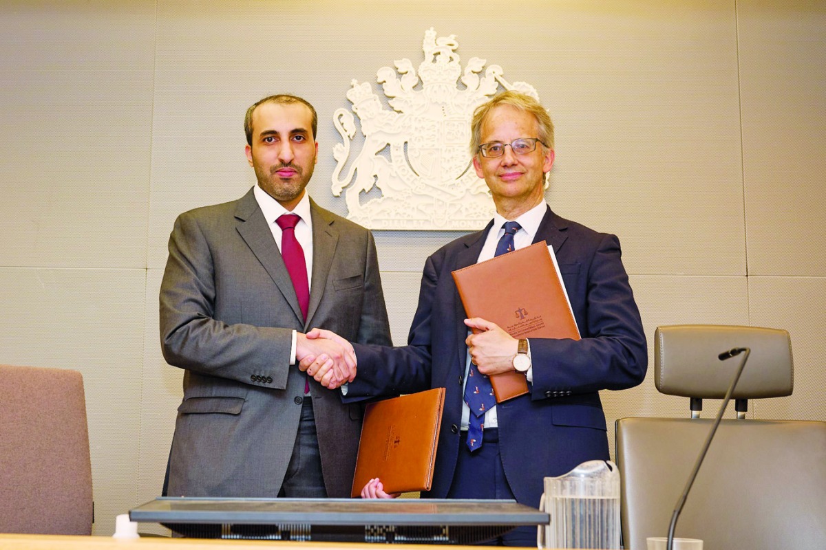 Officials of QICDRC and  Commercial Court of England and Wales during the MOG signing ceremony.