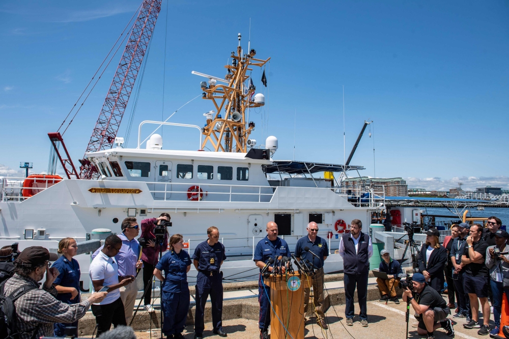 US Coast Guard (USCG) Captain Jamie Frederick speaks to reporters about the search efforts for the titan submersible that went missing near the wreck of the titanic, at Coast Guard Base in Boston, Massachusetts, on June 21, 2023. (Photo by Joseph Prezioso / AFP)