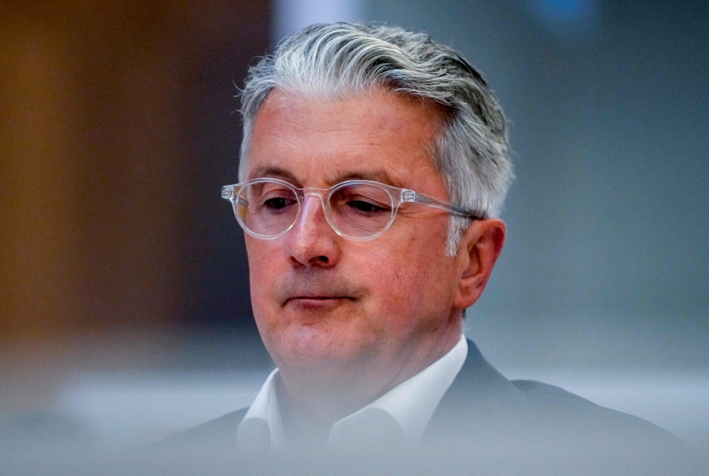 Rupert Stadler, former CEO of German car manufacturer Audi, waits for the verdict in his trial over the 'Dieselgate' emissions-cheating scandal that rocked parent company Volkswagen, at a district court in Munich, southern Germany, on June 27, 2023. (Photo by Matthias Schrader / POOL / AFP)