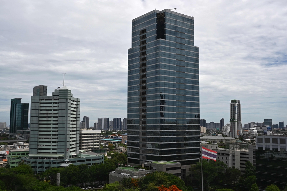 This picture shows the headquarters of Thailand痴 Revenue Department in Bangkok on June 26, 2023. (Photo by Lillian SUWANRUMPHA / AFP)
