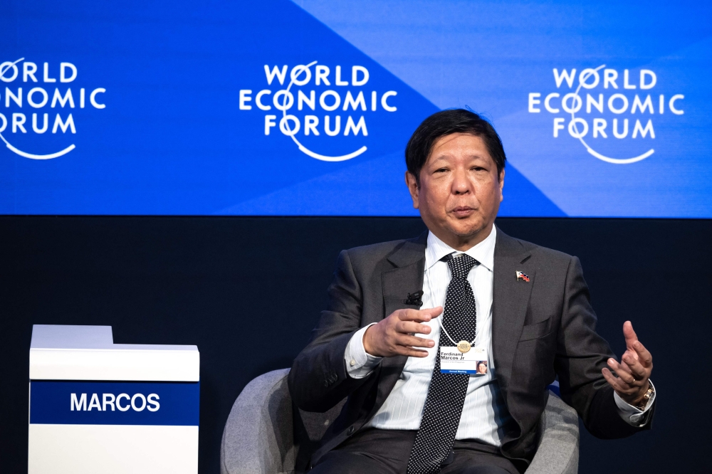File photo of Philippine President Ferdinand Marcos Jr speaks at a session during the World Economic Forum annual meeting in Davos on January 18, 2023. (Photo by Fabrice Coffrini / AFP)


