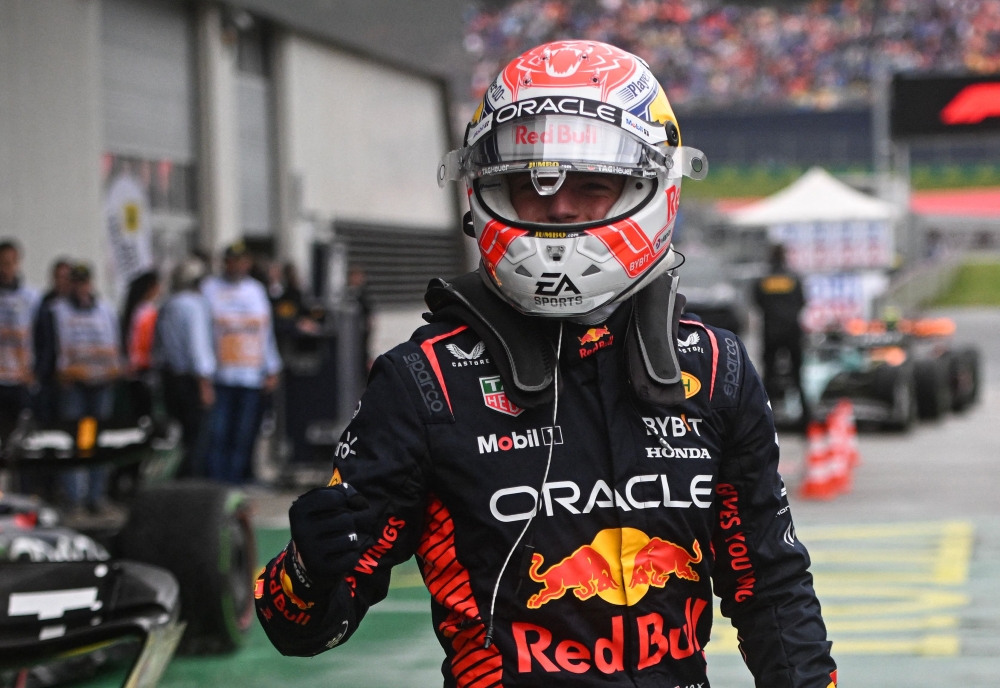 Red Bull Racing's Dutch driver Max Verstappen celebrates after the sprint at the Red Bull race track in Spielberg, Austria on July 1, 2023, ahead of the Formula One Austrian Grand Prix. (Photo by VLADIMIR SIMICEK / AFP)