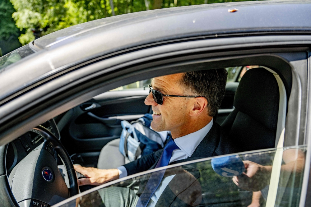 
Outgoing Prime Minister Mark Rutte arrives at Huis ten Bosch Palace to update King Willem-Alexander about the fall of the cabinet in The Hague on July 8, 2023. (Photo by Robin Utrecht / ANP / AFP) 