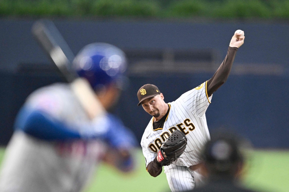 Blake Snell #4 of the San Diego Padres pitches during the first inning of a baseball game against the New York Mets at Petco Park on July 8, 2023 in San Diego, California. (Photo by DENIS POROY / GETTY IMAGES NORTH AMERICA / Getty Images via AFP)
