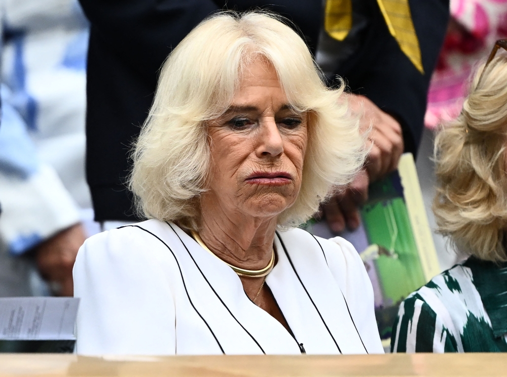 Britain's Queen Camilla is pictured upon her arrival at the Centre Court's Royal Box on the tenth day of the 2023 Wimbledon Championships at The All England Lawn Tennis Club in Wimbledon, southwest London, on July 12, 2023. (Photo by Sebastien Bozon / AFP)