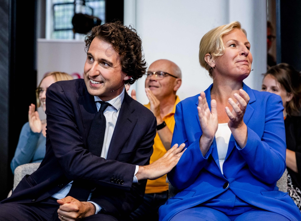 GroenLinks' leader Jesse Klaver (L) and PvdA leader Attje Kuiken react after the results of the members' consultations of the PvdA and GroenLinks over the cooperation between the two parties in Netherlands' parliamentary elections scheduled to be held in the fall of 2023, in Utrecht on July 17, 2023. (Photo by Sem van der Wal / ANP / AFP) / Netherlands OUT
