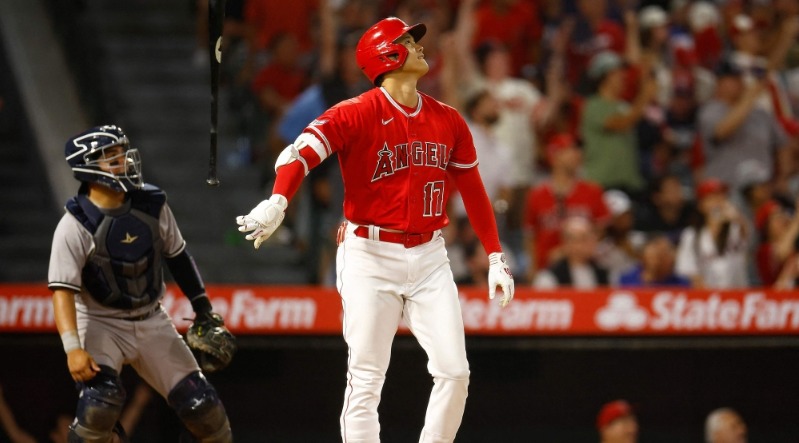 Shohei Ohtani #17 of the Los Angeles Angels after hitting a two-run home run against the New York Yankees in the seventh inning at Angel Stadium of Anaheim on July 17, 2023 in Anaheim, California. (Photo by RONALD MARTINEZ / GETTY IMAGES NORTH AMERICA / Getty Images via AFP)
