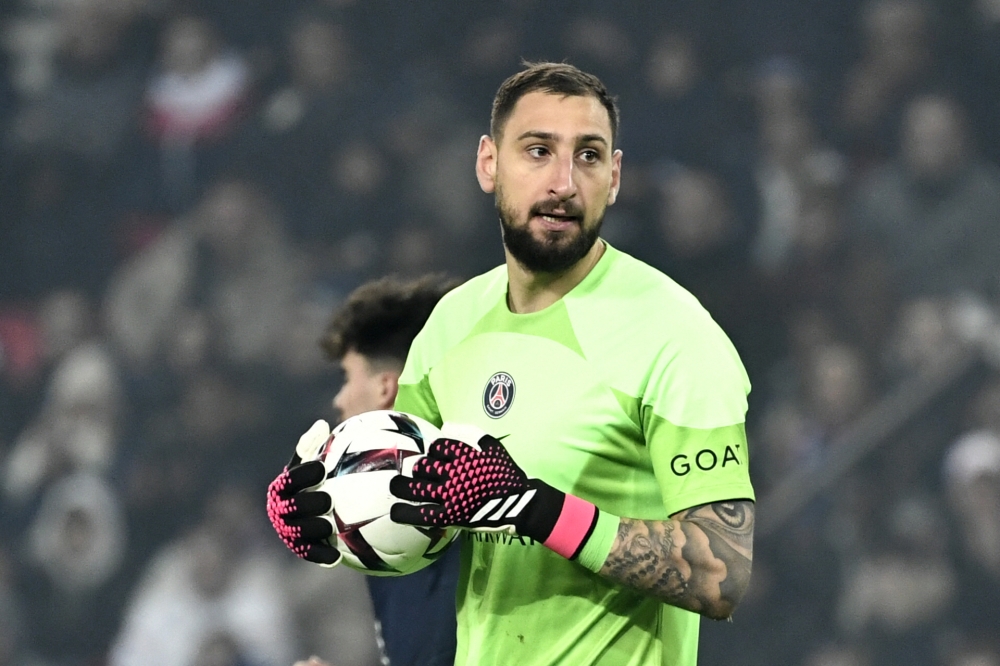 Paris Saint-Germain's Italian goalkeeper Gianluigi Donnarumma holds the ball during the French L1 football match between Paris Saint-Germain (PSG) and Olympique Lyonnais (OL) at The Parc des Princes Stadium in Paris on April 2, 2023. Photo by STEPHANE DE SAKUTIN / AFP