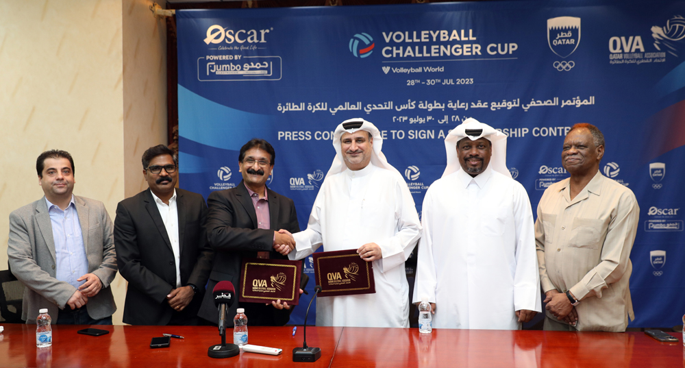 Qatar Volleyball Association (QVA) Secretary-General and the Tournament Director Youssef Ahmed Kanu (fourth left) shakes hands with Jumbo Electronics Head of Operations Ganesh Mithra during a sponsorship signing ceremony. QVA Board Member and Chairman of Marketing and Security Committee Saeed Al Hitmi (second right), Jumbo Chief Financial Officer Sudheesh Pookodan (second left), and QVA Technical Director and VCC Competition Manager Hussein Imam Ali (right) are also present. Picture by: Salim Matramkot/The Peninsula