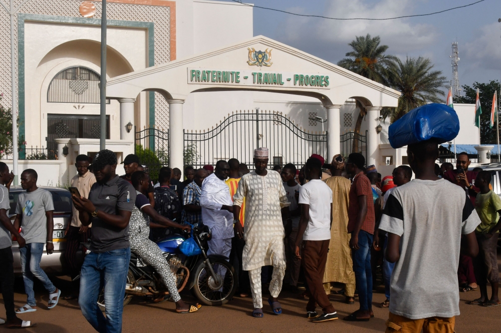  Demosnstrators gather to protest the detention of President Mohamed Bazoum by the Presidential Guard in Niamey on July 26, 2023. (Photo by AFP)
