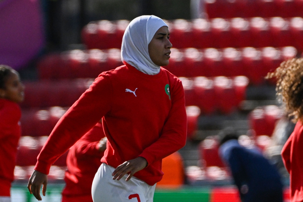 Morocco's defender #03 Nouhaila Benzina warms up before the start of the Australia and New Zealand 2023 Women's World Cup Group H football match against South Korea in Adelaide on July 30, 2023. (Photo by Brenton Edwards / AFP)