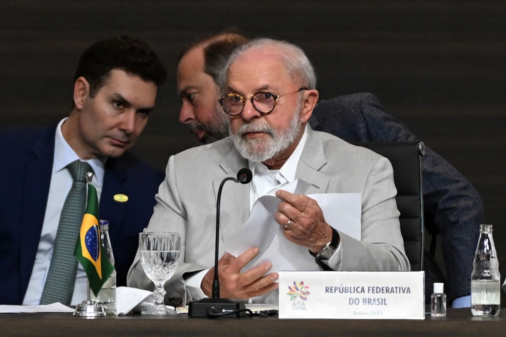 Brazil's President Luiz Inacio Lula da Silva attends the Amazon Summit at the Hangar Convention Centre in Belem, Para State, Brazil, on August 9, 2023. (Photo by Evaristo SA / AFP)
