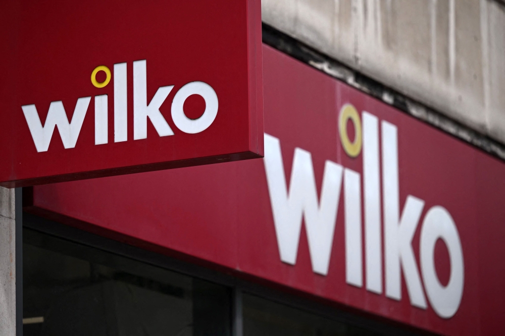 (Files) Signage outside a branch of the British high-street retail chain 