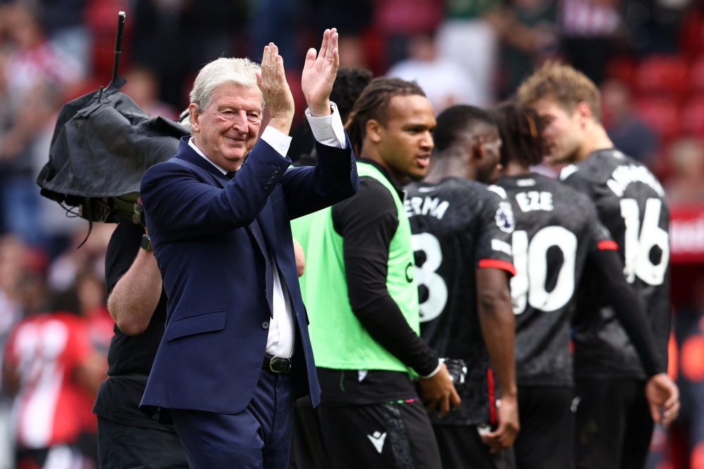 Crystal Palace's English manager Roy Hodgson (L) applauds fans on the pitch after the English Premier League football match between Sheffield United and Crystal Palace at Bramall Lane in Sheffield, northern England on August 12, 2023. Palace won the game 1-0. (Photo by Darren Staples / AFP)