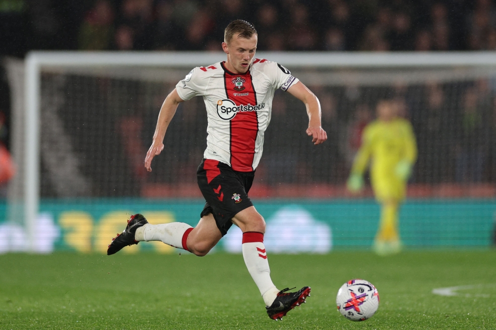 Southampton's English midfielder James Ward-Prowse runs with the ball during the English Premier League football match between Southampton and Bournemouth at St Mary's Stadium in Southampton, southern England on April 27, 2023. Photo by Adrian DENNIS / AFP