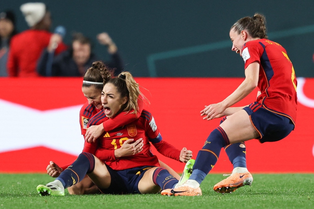 Spain's defender #19 Olga Carmona celebrates scoring her team's second goal during the Australia and New Zealand 2023 Women's World Cup semi-final football match between Spain and Sweden at Eden Park in Auckland on August 15, 2023. (Photo by Michael Bradley / AFP)
