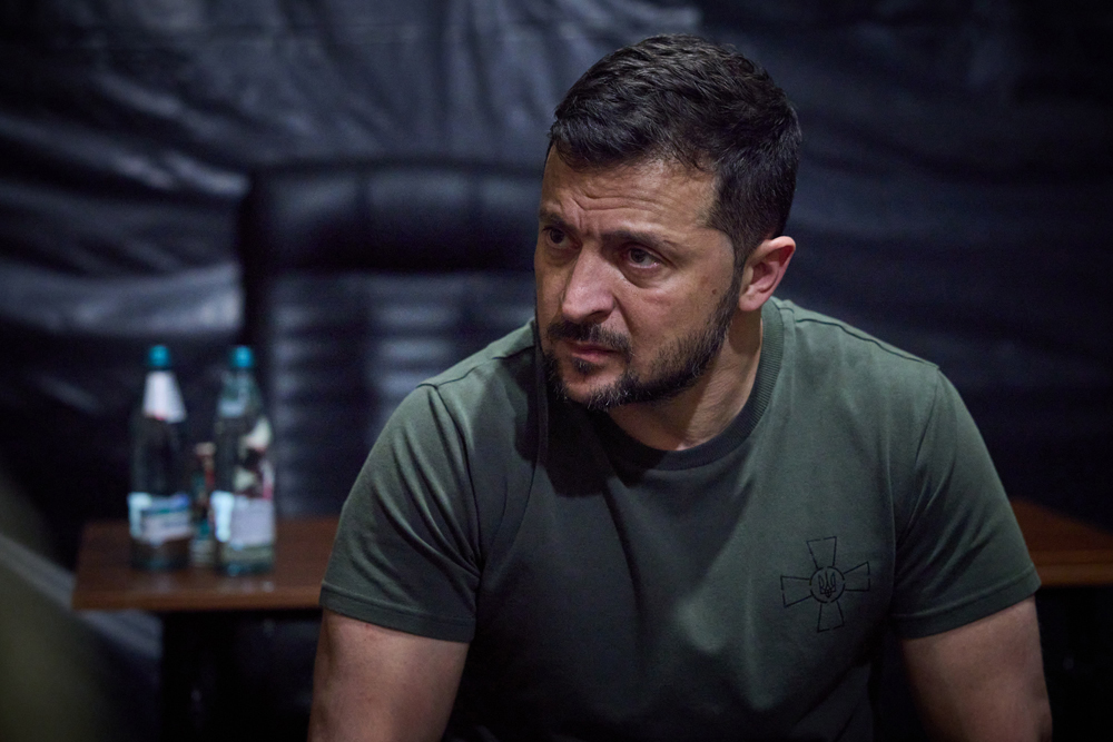 A handout photograph taken and released by Ukrainian Presidential Press Service on August 14, 2023, shows Ukrainian President Volodymyr Zelensky visiting the main command post of the operational-tactical group 