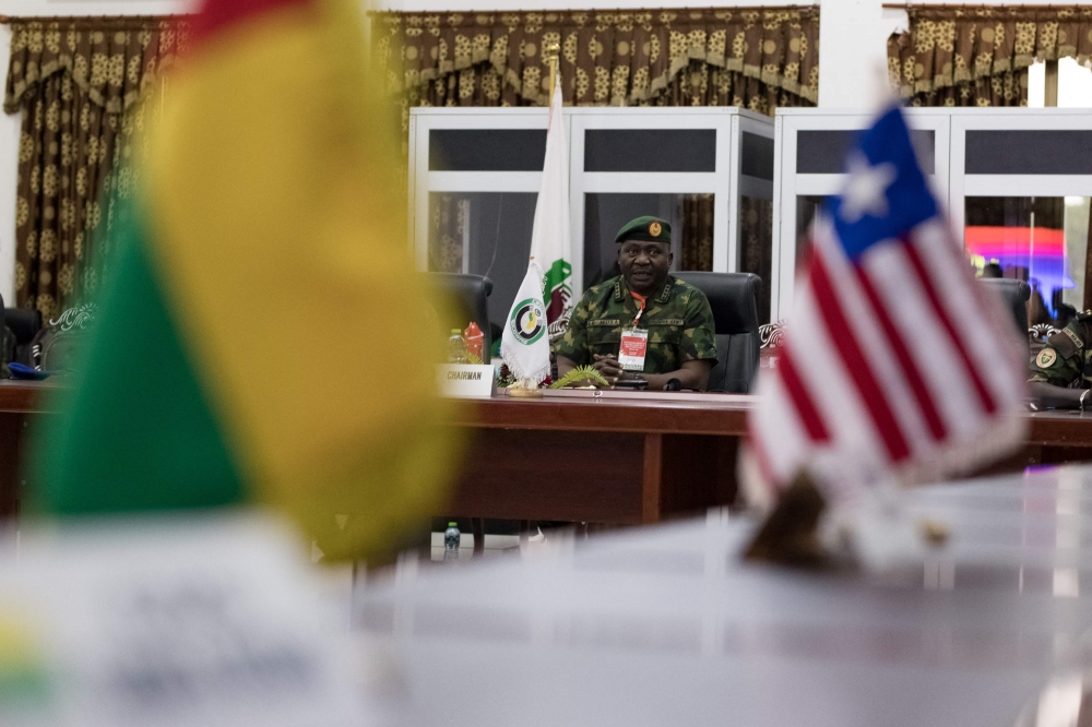 Nigeria's Chief of Defence Staff and chairman of the Economic Community of West African States (ECOWAS) commitee, Christopher Musa, welcomes the media at the end of their deliberations in Accra, on August 18, 2023. (Photo by GERARD NARTEY / AFP)
