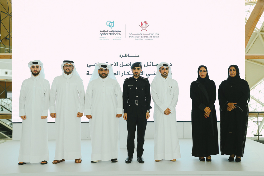 Officials at the debate event. 