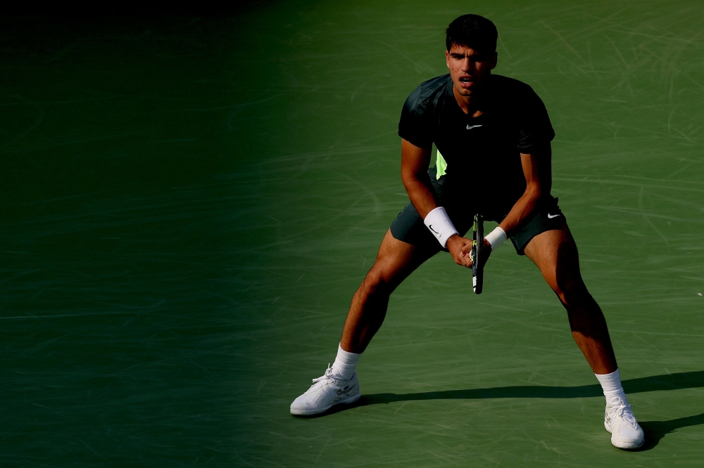 AUGUST 19: Carlos Alcaraz of Spain plays Hubert Hurkacz of Poland during the semifinals of the Western & Southern Open at Lindner Family Tennis Center on August 19, 2023 in Mason, Ohio. Matthew Stockman/Getty Images/AFP