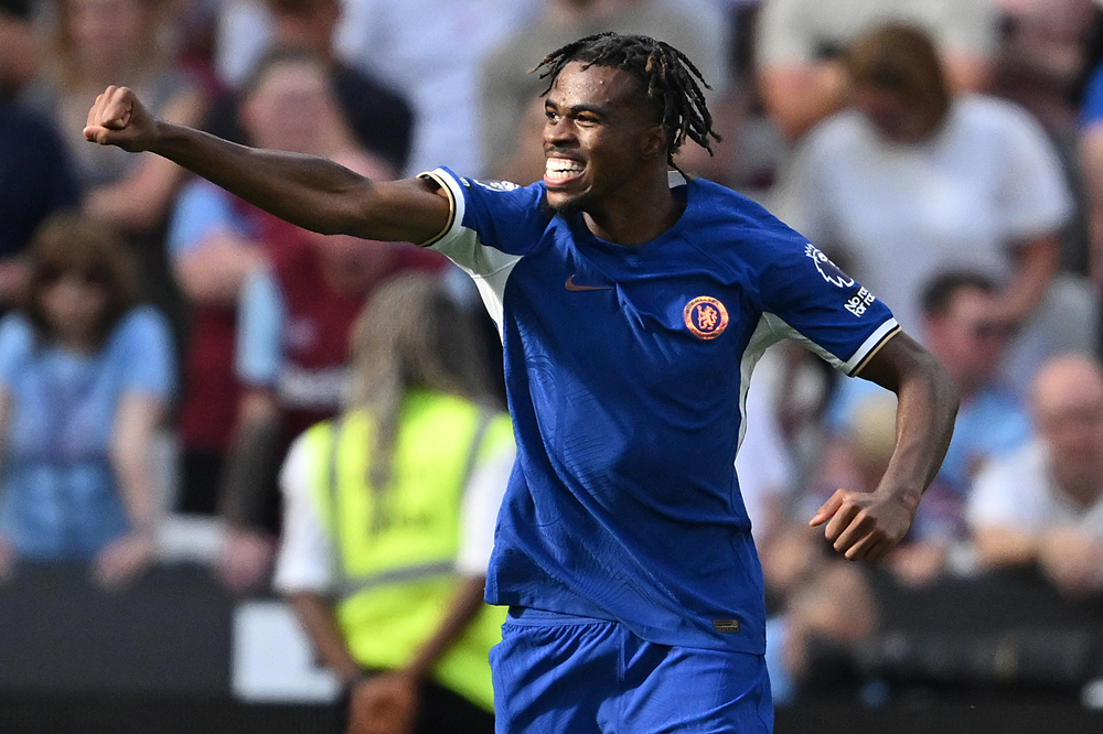 Chelsea's English midfielder #17 Carney Chukwuemeka celebrates after scoring a goal during the English Premier League football match between West Ham United and Chelsea at the London Stadium, in London on August 20, 2023. Photo by JUSTIN TALLIS / AFP
