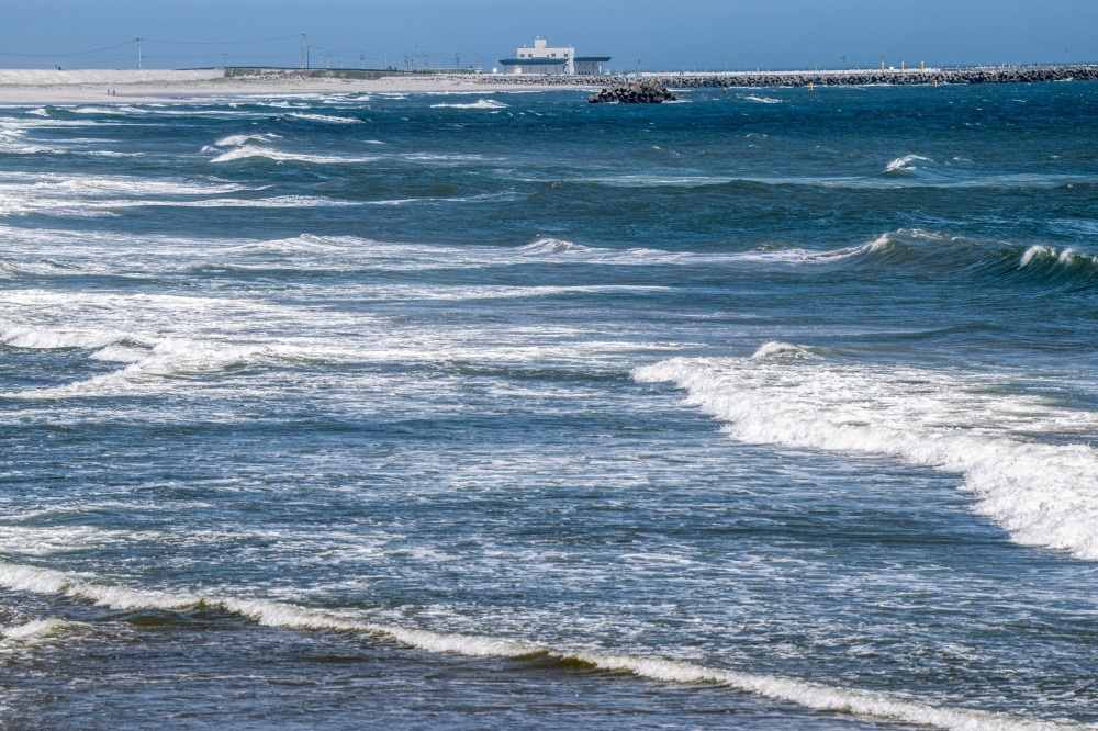 A shoreline is pictured from Futaba-machi, Fukushima Prefecture, around 5 km away from the crippled Fukushima-Daiichi nuclear plant on August 24, 2023, the day on which Japan's government plan to begin releasing wastewater from the stricken plant into the Pacific Ocean. (Photo by Philip FONG / AFP)