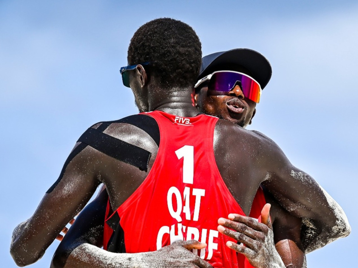 Qatar’s Cherif Younousse and Ahmed Tijan.