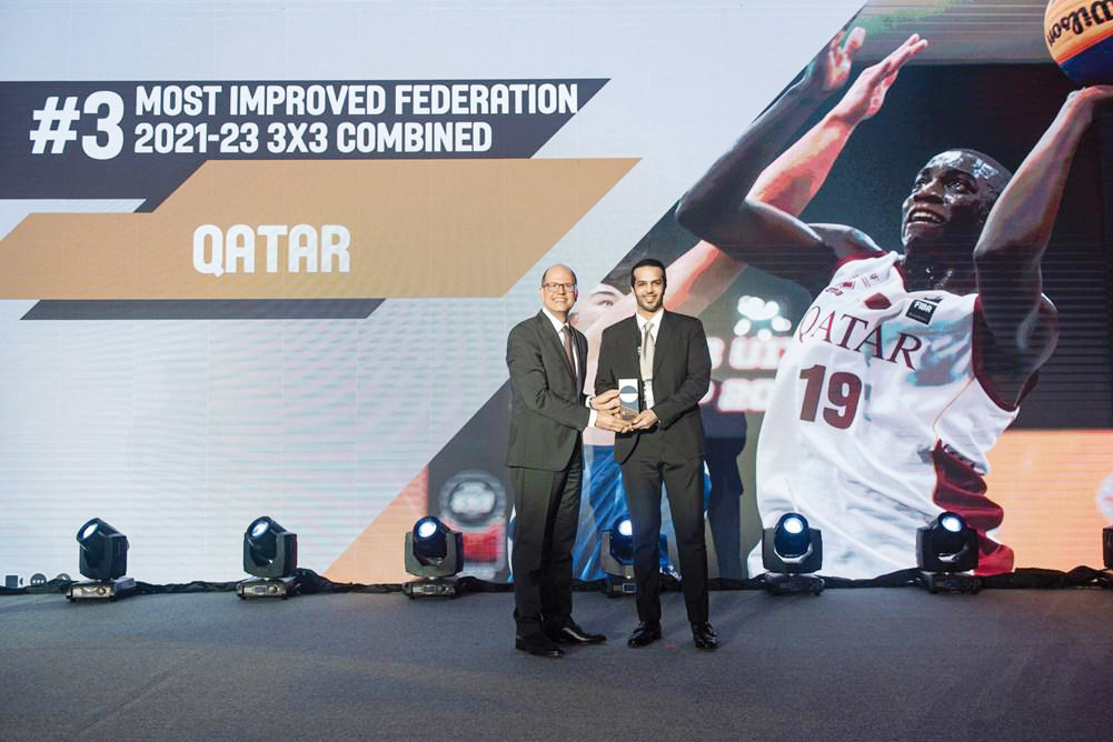 Qatar Basketball Federation (QBF) President Mohammed Saad Al Mughaiseeb (right) receives the award during the FIBA Awards ceremony held on the lines of the international federation's General Assembly in Manila, Philippines, yesterday.